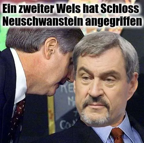 Ein zweiter Wels hat eine Schwimmerin angegriffen. Auf dem Bild wird es Markus Söder erzahlt als ob es voll ernst wie ein Bombenangriff ist)