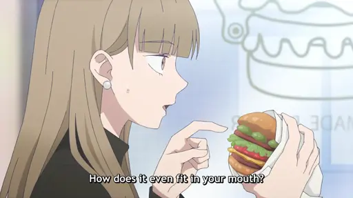Koyuki pointing at / holding a stacked burger: "How does it even fit in your mouth?"
