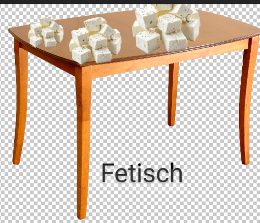 Ein Tisch mit Feta Käse drauf, der Text dazu ist Fetisch