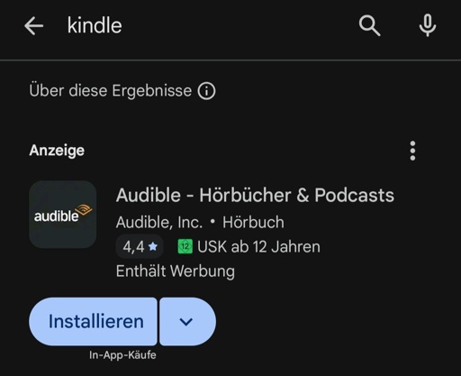 Suchergebnisse für die E-Book App "Kindle" im Android Play Store. Das oberste Werbe-Ergebnis ist die verwandte App "Audible" für Audio-Bücher.
